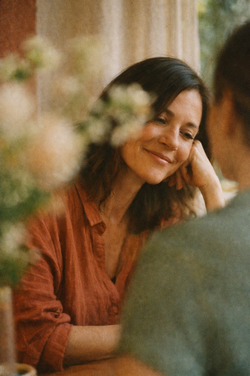 Woman smiling during a soft consultation moment